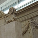 Ara Pacis Augustae, lion-griffin and relief fragment with two men, one wearing toga and veiled
