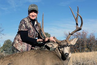 109-female-hunter-with-mule-deer
