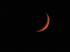 August 21, 2020 - A smoke crescent moon. (David Canfield)