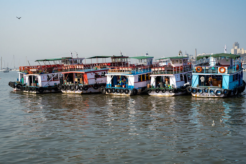 Mumbai, India - March 1, 2020: Line up of ferries waiting to take tourists to Elephata Caves and Islands, near the Gateway of India<br/>© <a href="https://flickr.com/people/39908901@N06" target="_blank" rel="nofollow">39908901@N06</a> (<a href="https://flickr.com/photo.gne?id=50324053766" target="_blank" rel="nofollow">Flickr</a>)