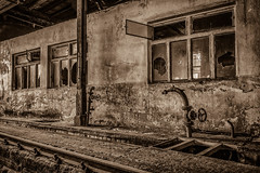 View to the old abandoned workshop - sepia