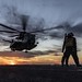 Sailors direct an MH-53E Sea Dragon helicopter aboard the Wasp-class amphibious assault ship USS Iwo Jima (LHD 7).