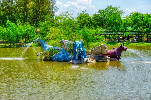 Animal sculpture fountains in a lake in Muang Boran (Ancient City) open air museum in Samut Phrakan near Bangkok, Thailand