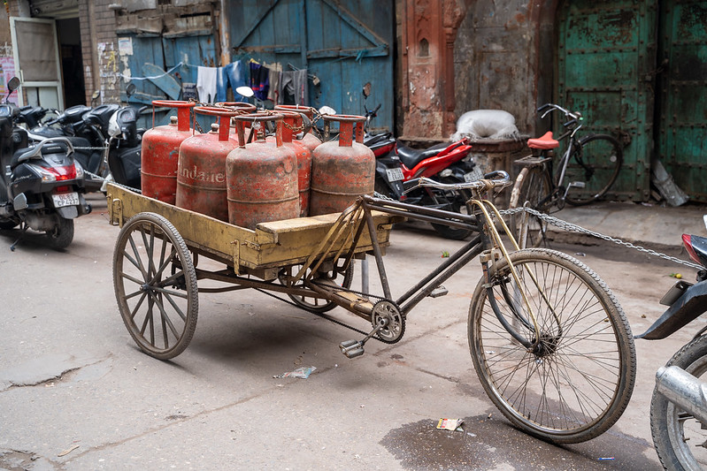 Delhi, India - December 14, 2019: Bicycle cart with propane gas tanks in Chandi Chowk market in Old Delhi<br/>© <a href="https://flickr.com/people/39908901@N06" target="_blank" rel="nofollow">39908901@N06</a> (<a href="https://flickr.com/photo.gne?id=50662263808" target="_blank" rel="nofollow">Flickr</a>)