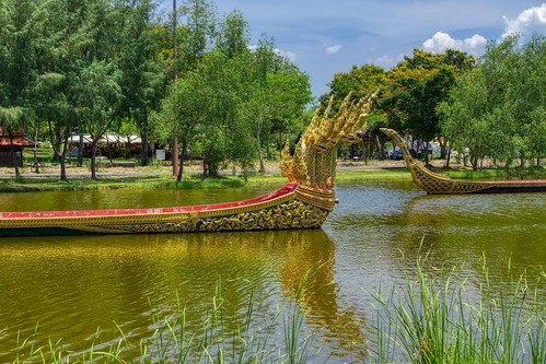 Replica of the Royal Barge Procession in a lake in Muang Boran (Ancient City) in Samut Phrakan near Bangkok, Thailand
