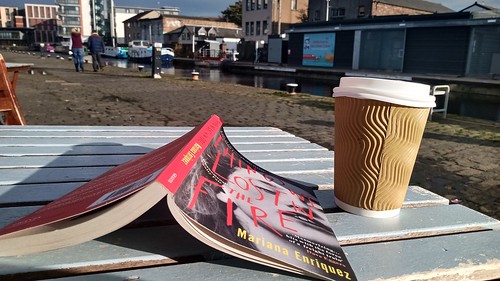 Coffee and Book by the Canal