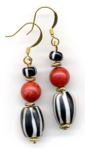 earrings of red coral, black and white striped beads from Africa