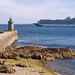 Cruise ship anchored off lighthouse at Castle Cornet - Guernsey