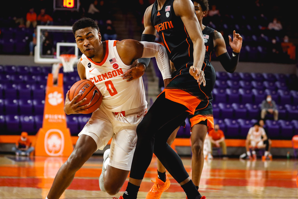 Clemson Basketball Photo of Clyde Trapp and miami