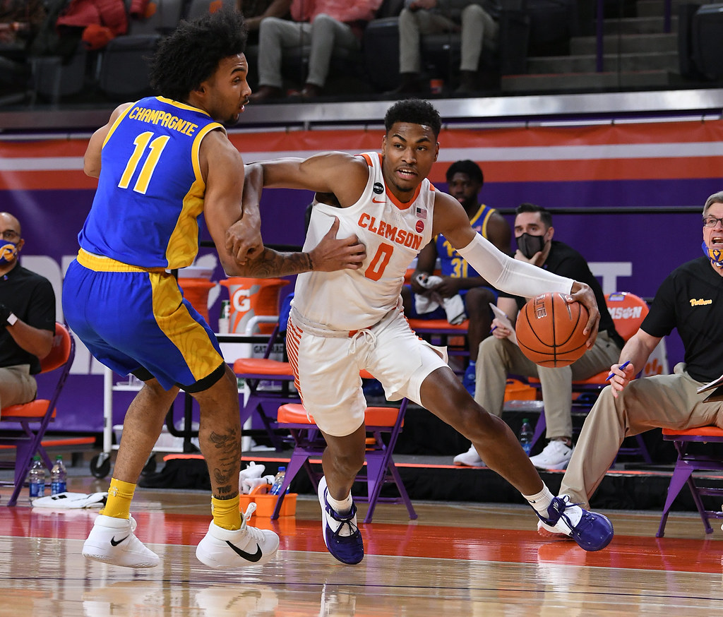 Clemson Basketball Photo of Clyde Trapp and pittsburgh