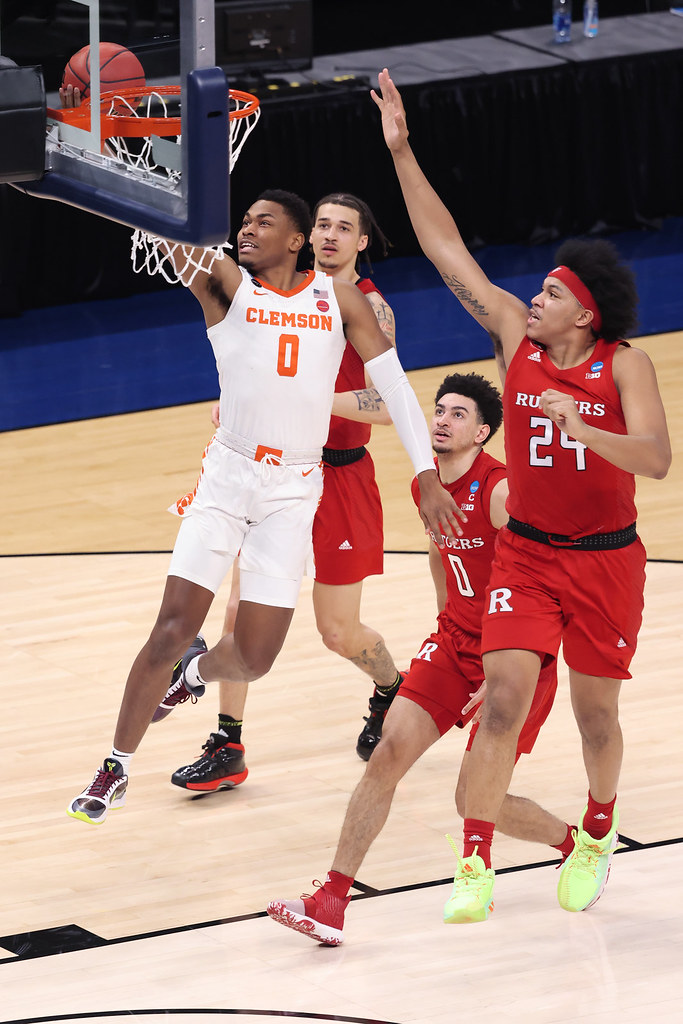 Clemson Basketball Photo of Clyde Trapp and rutgers