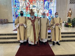 Bishop Persico with newly ordained Deacons.