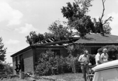 Downed tree on Thornton home after the 1981 tornado. (City of Thornton / Colorado Virtual Library)