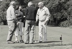 Discussing a shot on the putting course