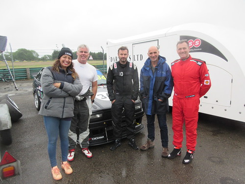 Photogenic Alfa racers in the rain at Croft