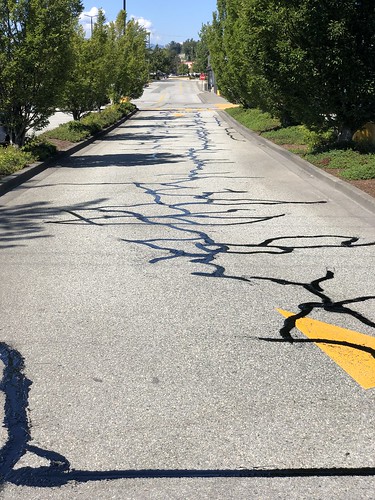 Commercial driveway crack sealing.