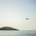 An airplane getting ready to land at Skiathos Airport, Greece