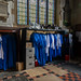 Rack of religious robes, seen at Saint Helen's Church in the city of Abingdon in Oxfordshire, England, United Kingdom