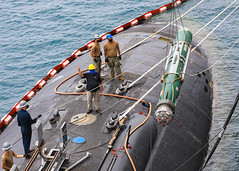 USS Asheville (SSN 758) offloads a Mark 48 advanced capability torpedo in Polaris Point, Guam.