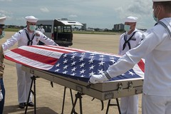 U.S. service members assigned to the Defense POW/MIA Accounting Agency (DPAA) and the U.S. Embassy participate in a repatriation ceremony.