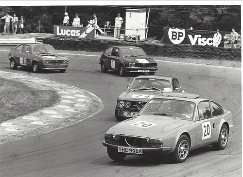 Peter Cabrol's Junior Zagato leads a group at Brands