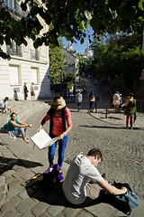French artists drawing at Dalida Place, in front of Basilique of the Sacré Cœur, Montmartre, Paris, France