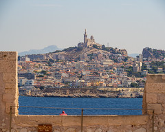 View of Notre-Dame de la Garde from Château d'If - Marseille<br/>© <a href="https://flickr.com/people/13445173@N06" target="_blank" rel="nofollow">13445173@N06</a> (<a href="https://flickr.com/photo.gne?id=51685923883" target="_blank" rel="nofollow">Flickr</a>)