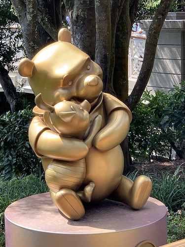 Winnie the Pooh and Piglet Golden Statue in the Magic Kingdom • <a style="font-size:0.8em;" href="http://www.flickr.com/photos/28558260@N04/51706972486/" target="_blank">View on Flickr</a>