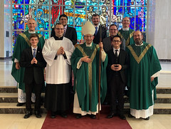 The seminarians and staff join Bishop Persico for Mass