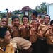 Cheerful Indonesian students wearing  Pramuka uniforms in Kalimantan