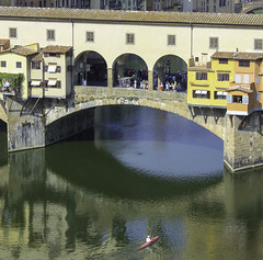Kayaking under the Ponte Vecchio, Florence, Italy