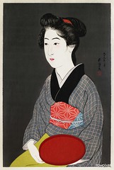 Waitress Holding a Tray (Portrait of Onao, a Maid at the Matsuyoshi Inn, Kyoto) (1920) print in high resolution by Goyō Hashiguchi. Original from the Minneapolis Institute of Art. Digitally enhanced by rawpixel.