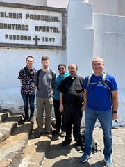 Chandler Villavueva, Michael Scanga, Zachary Lentz, Fr. Michael Kesicki, and Fr. Scott Jabo at Santiago, the parish of Blessed Fr. Stanley Rother.
