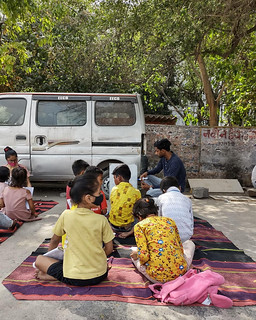 Blue Pen Volunteer Vipul is teaching Alphabet to young slum kids of Noida centre, today 01.05.22