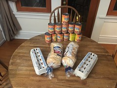 Grocery purchase, eggs, bagels and cans of chili