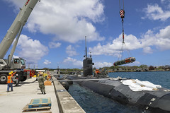 USS Annapolis (SSN 760) loads a Mark 67 submarine launched mobile mine in Apra Harbor, Guam.