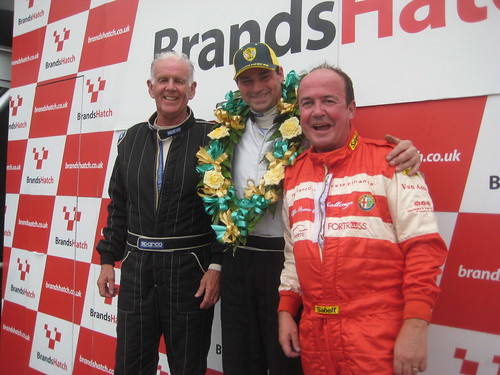 Robin Eyre Maunsell and John Griffiths celebrate at Brands with winner Roger Evans