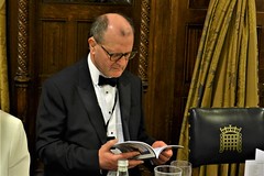 Professor Moriarty consults the new BSI book "The Dean of British Sherlockians: A Celebration of the Life & Work of S.C. Roberts" by Nicholas Utechin, Roger Johnson and Guy Marriott (photo by Jean Upton)