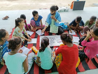 Blue Pen’s Volunteer Shama teaching Chapter Balanced diet to 3rd grade slum students at Nithari centre, today 31.7.22