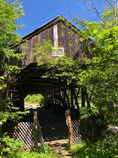 Bacon Bridge in Clarksville, New Hampshire. Spanning Connecticut River. Pittsburg is on the far side of this unused bridge. The only covered bridge spanning the Connecticut River that does not go into Vermont.