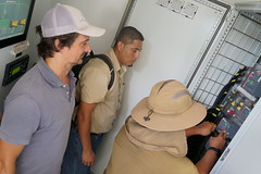 operator training on the LV distribution panel of the hybrid mini-grid system at Indian Creek...
