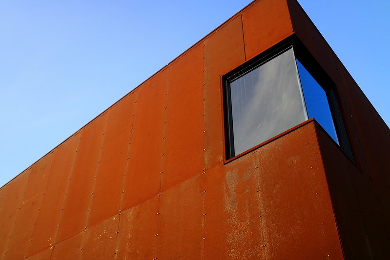 Modern Architecture -  A New Building With Rusty Metallic Wall Plates<br/>© <a href="https://flickr.com/people/32512570@N06" target="_blank" rel="nofollow">32512570@N06</a> (<a href="https://flickr.com/photo.gne?id=52496262929" target="_blank" rel="nofollow">Flickr</a>)