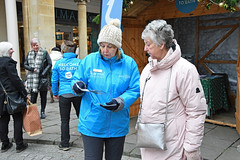 Welcome to Bath. Greeters in the High Street despite the winter cold