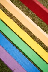 Rainbow bars on park bench