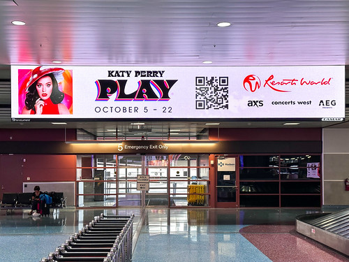 Katy Perry advertisement on digital sign inside Las Vegas Airport