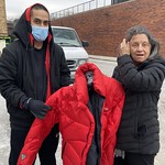 Joanne Stavrakas m/Lenette Collias donating coats/blankets to “Care for Real”, in Chiago