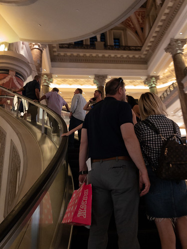 Las Vegas Tourists ascend the curved escalator in Caesars Palace