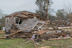 Damage to cars and homes in Wynne, AR following a deadly tornado on March 31, 2023