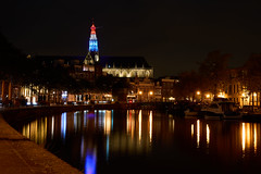 The tower of the Grote Bavo Church in Haarlem in the Dutch tricolor on liberation day