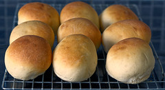 Fresh out of the oven bread rolls , baps , or as we call them in Yorkshire , breadcakes . The aroma , not a smell , in our kitchen is wonderful .
